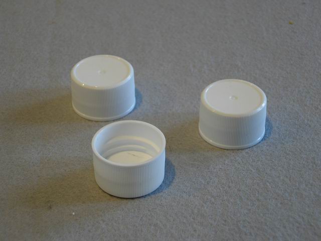 White polypropylene cap w/foam 28/410